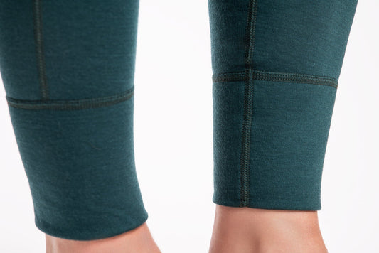 merino wool leggings with black accents on a white background