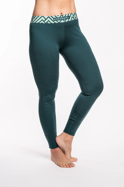 Teal fine merino wool leggings with a patterned waistband on a white background